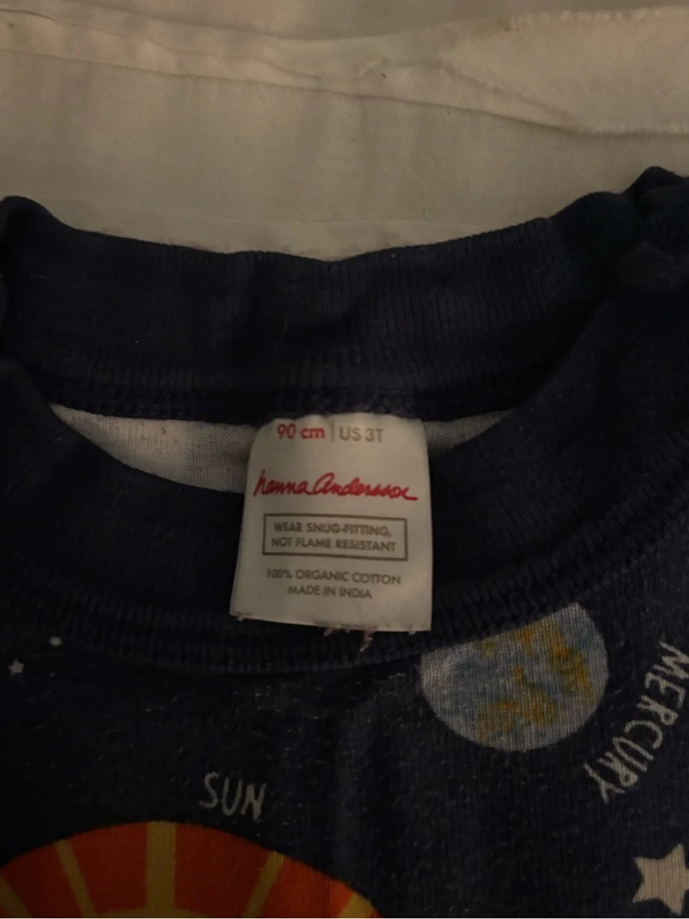 Hanna Andersson Navy Space Print Pajama Set with Yellow Sun Accents